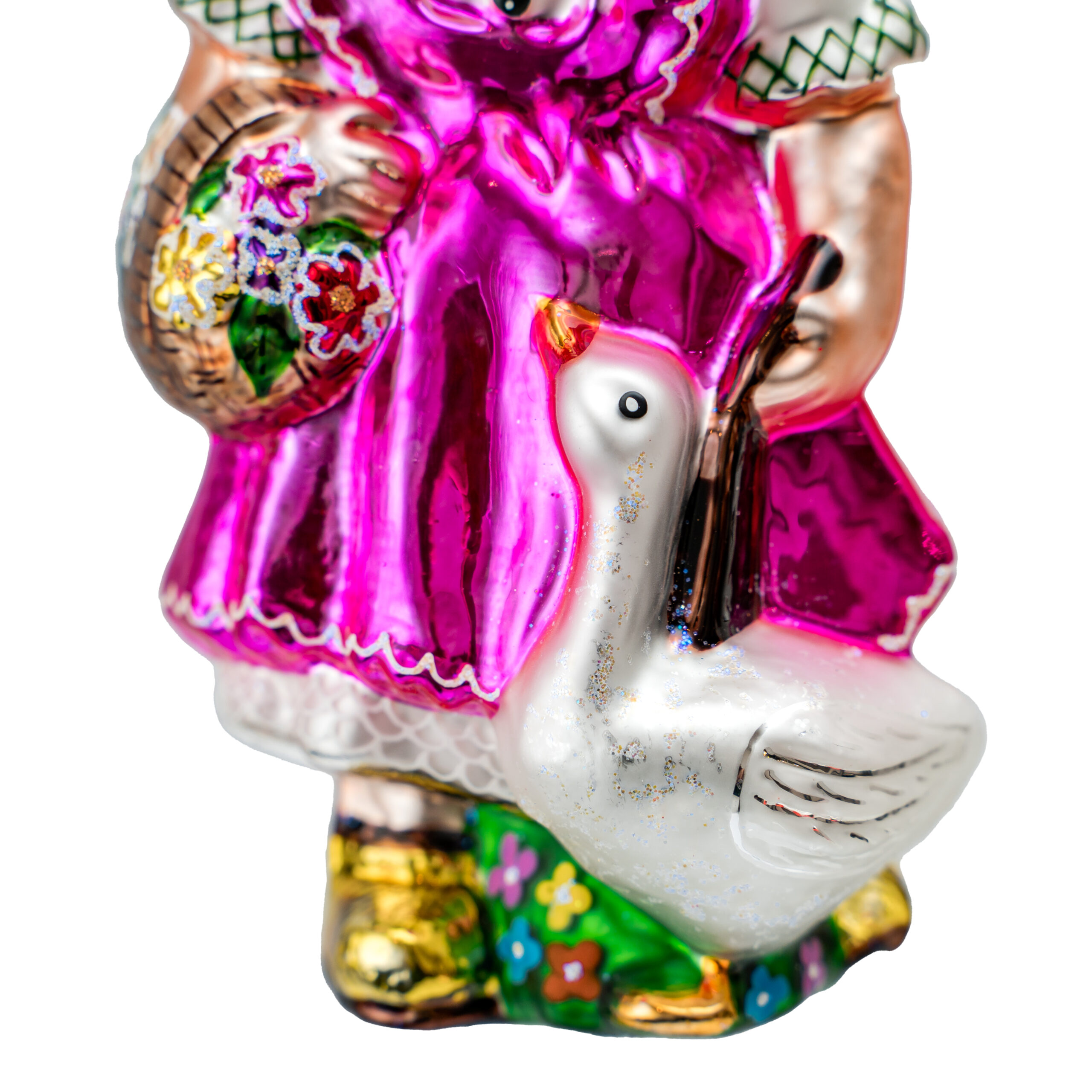 Hand-painted glass Christmas ornament depicting a girl goose herder in traditional attire