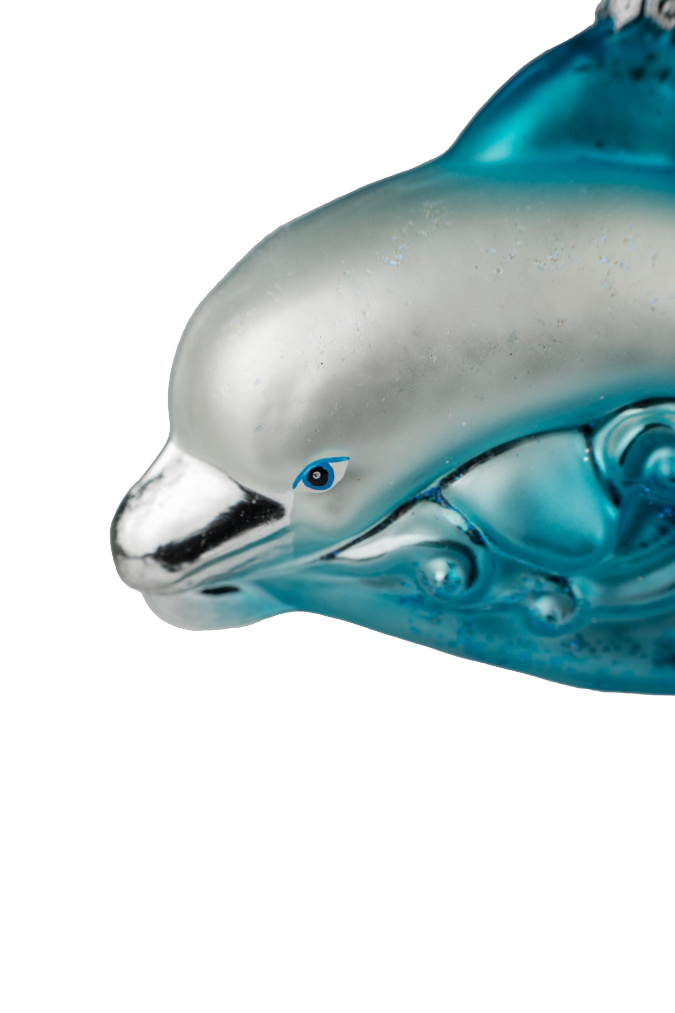 Dolphin glass Christmas ornament swimming over waves