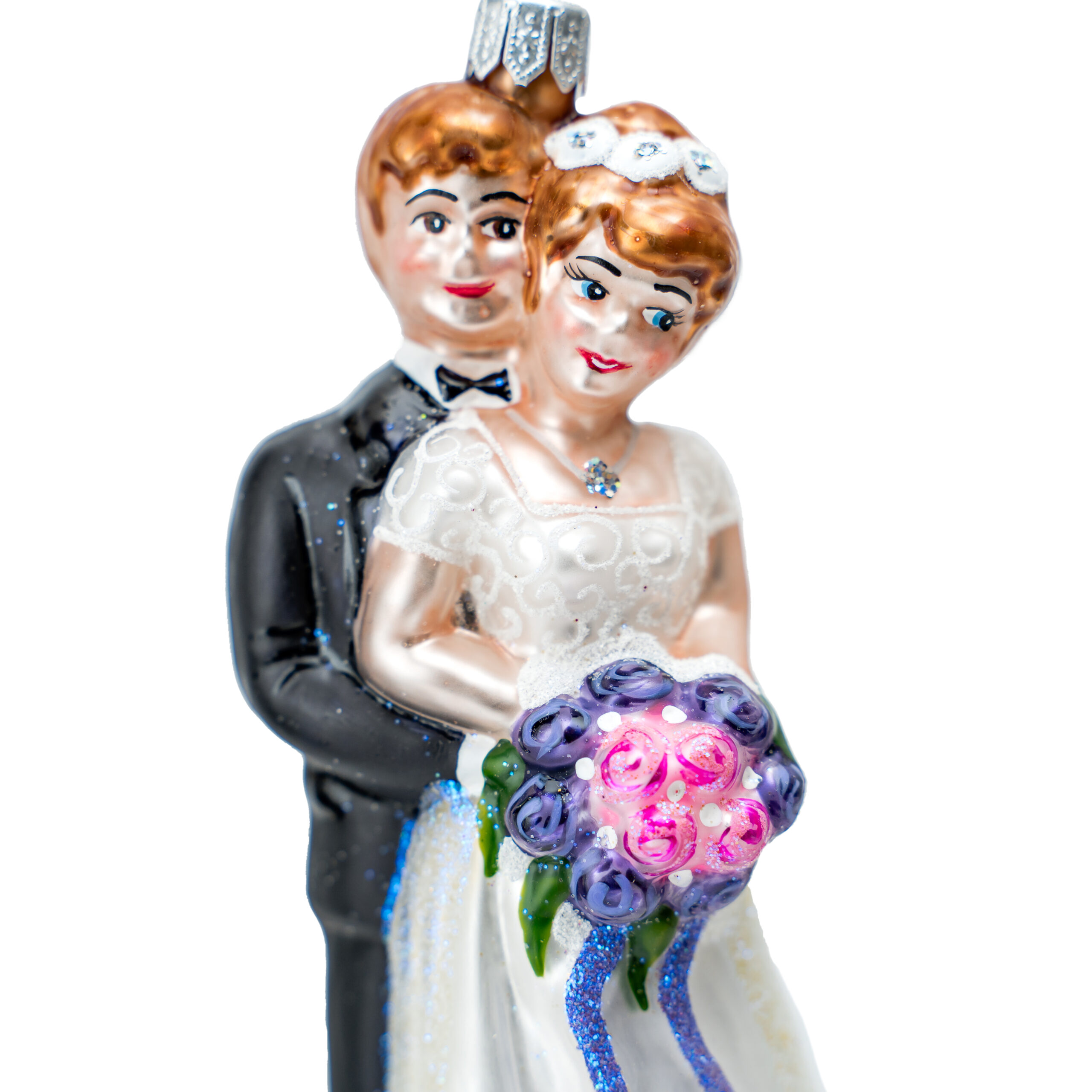 Handmade glass Christmas ornament depicting a wedding couple, bride and groom holding a purple bouquet, hand-painted with elegant details